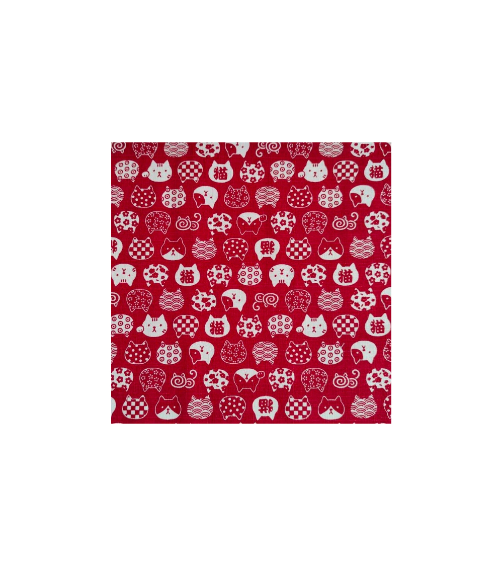 Japanese dobby fabric. Cats' heads in red.