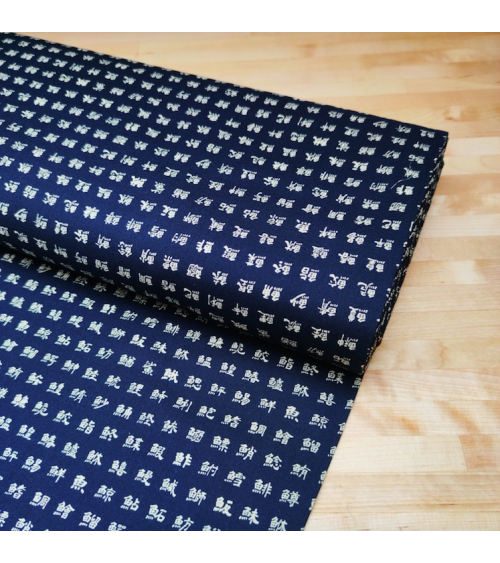 Japanese cotton fabric. Kanjis "names of fishes" on blue.