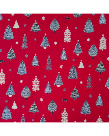 Tela japonesa de Navidad con abetos en rojo.
