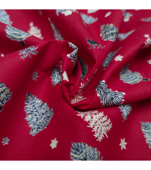 Tela japonesa de Navidad con abetos en rojo.
