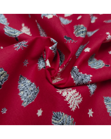 Tela japonesa de Navidad con abetos en rojo.