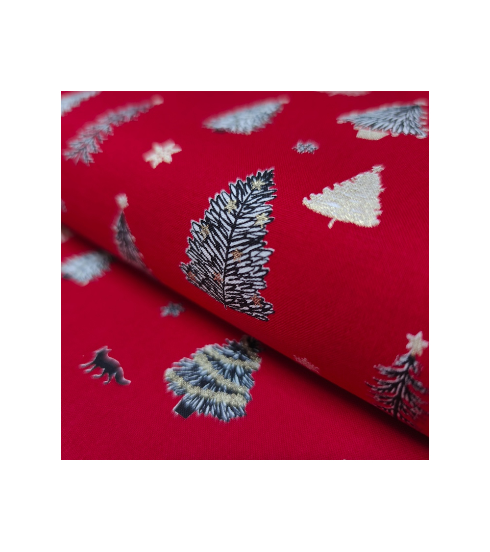 Tela japonesa de Navidad con abetos en rojo.