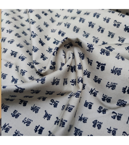 Tela japonesa. Kanjis "nombres de peces" sobre arena.