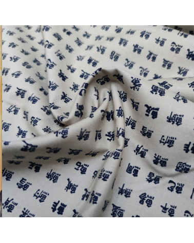 Tela japonesa. Kanjis "nombres de peces" sobre arena.