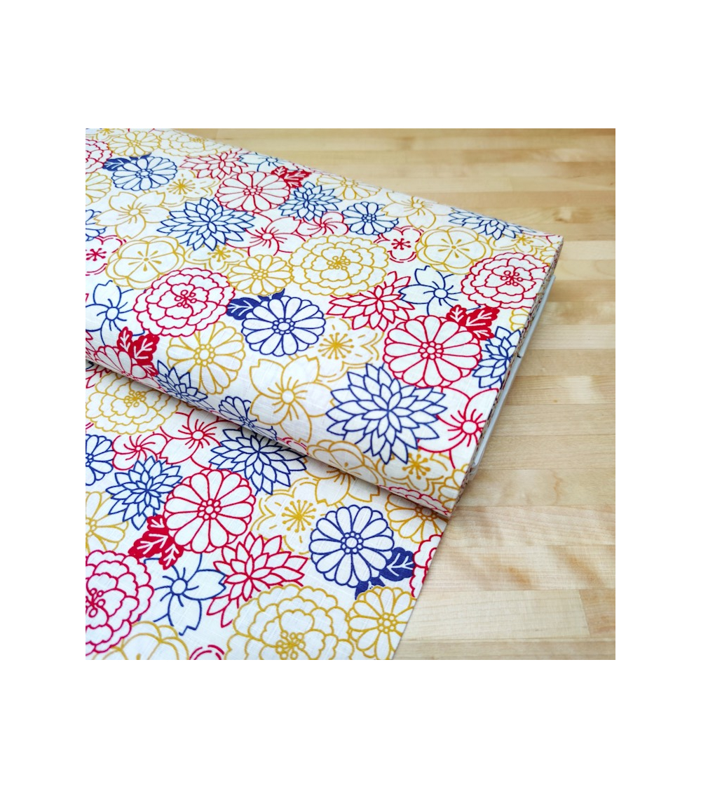 Japanese cotton fabric. Flowers on white dobby.
