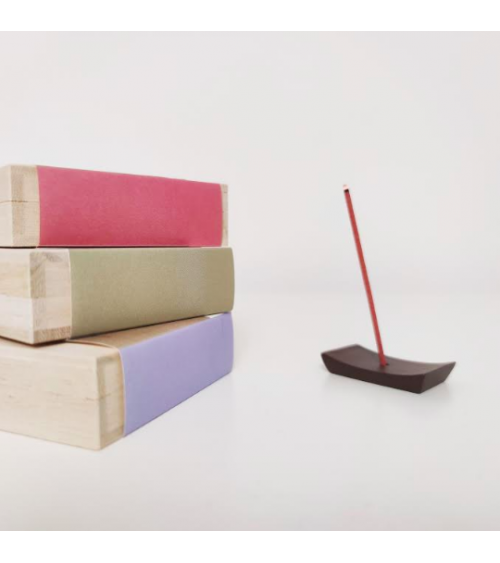 Incense and incense holder in a wooden box