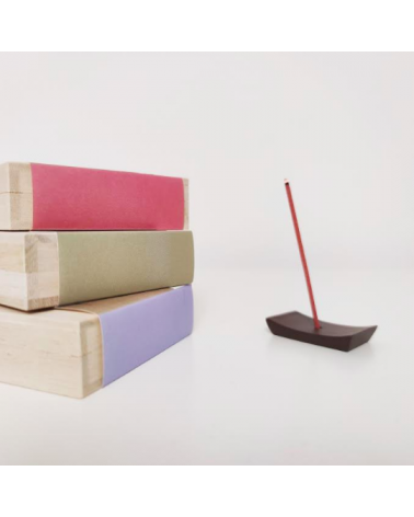Incense and incense holder in a wooden box
