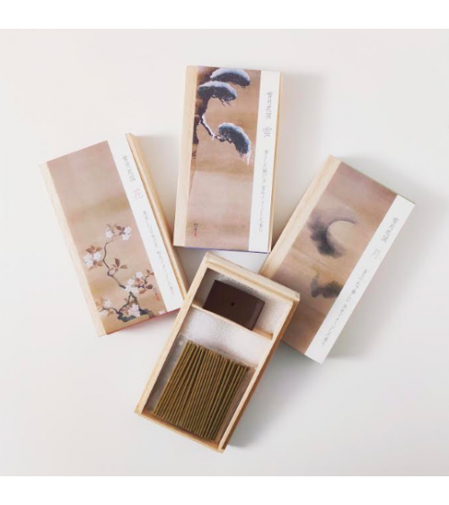 Incense and incense holder in a wooden box