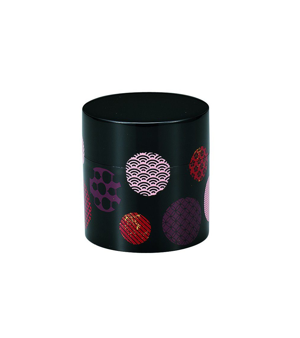Bote para té con círculos con motivos japoneses y fondo negro