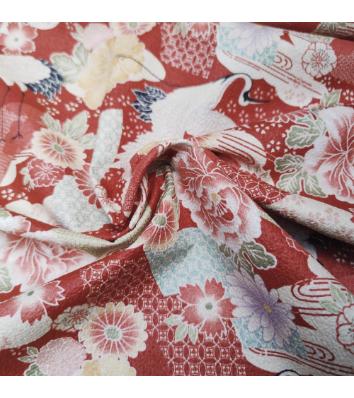 Japanese fabric with cranes and flowers in red in cotton crepe.