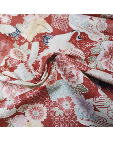 Japanese fabric with cranes and flowers in red in cotton crepe.