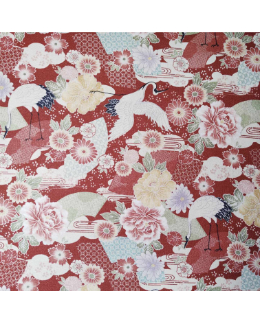 Tela Japonesa grullas y flores en rojo en crepe de algodón.