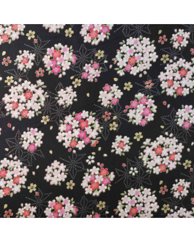 Tela japonesa con sakuras y asanoha sobre fondo negro
