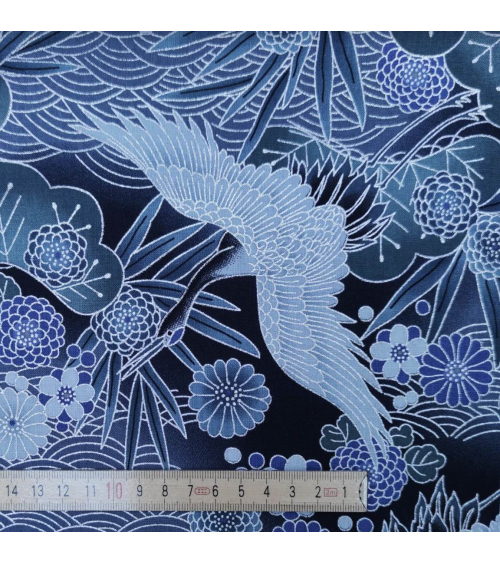 Japanese cotton fabric of cranes with silver details.