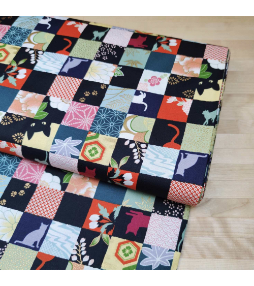 Tela japonesa. Patchwork Gato en colores brillantes.