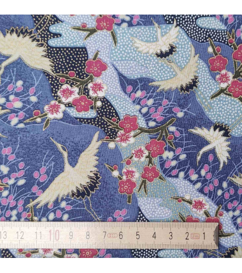 Japanese cotton fabric of cranes and ume with golden details.