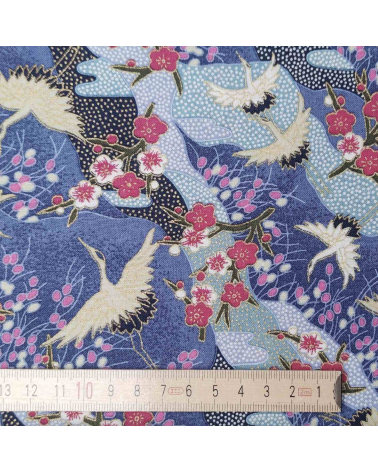 Japanese cotton fabric of cranes and ume with golden details.