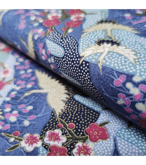 Japanese cotton fabric of cranes and ume with golden details.