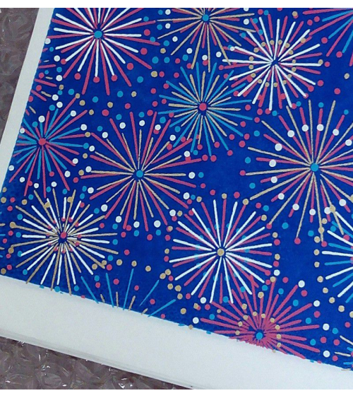 Papel Chiyogami fuegos artificiales sobre fondo azul
