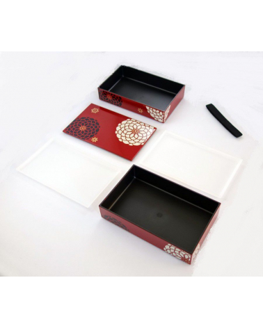 Bento box (lunch box) flores blancas y negras sobre fondo rojo