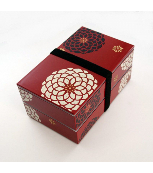 Bento box (lunch box) flores blancas y negras sobre fondo rojo