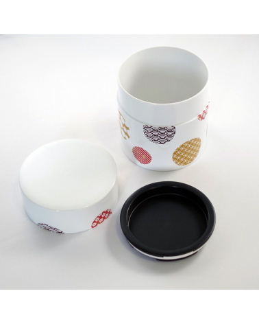 Bote para té con círculos con motivos japoneses y fondo blanco