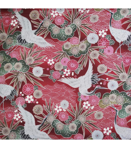 Japanese cotton fabric of cranes in red with silver details.