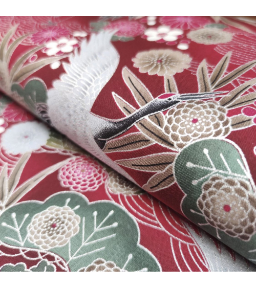 Japanese cotton fabric of cranes in red with silver details.
