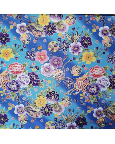 Tela japonesa grullas de origami en turquesa con detalles en oro.