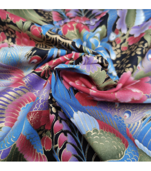 Japanese peacock fabric in blue with gold details.