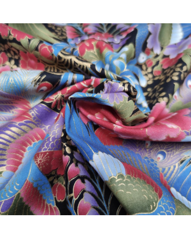 Japanese peacock fabric in blue with gold details.