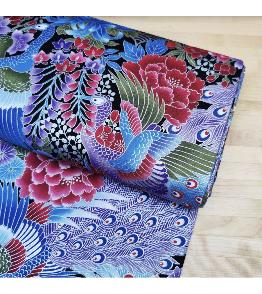 Japanese peacock fabric in blue with silver details.
