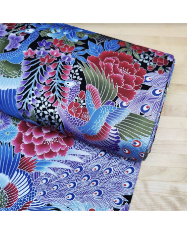 Japanese peacock fabric in blue with silver details.