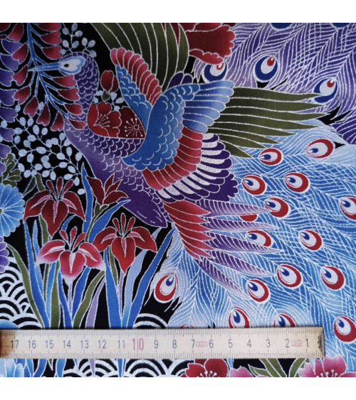Japanese peacock fabric in blue with silver details.
