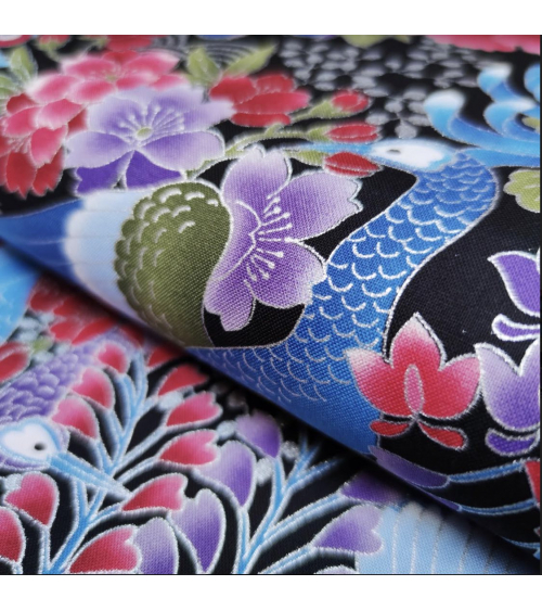 Tela japonesa pavos reales en azules con detalles en plata.
