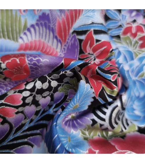 Tela japonesa pavos reales en azules con detalles en plata.