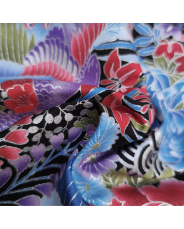 Tela japonesa pavos reales en azules con detalles en plata.