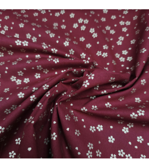 Japanese cotton fabric with golden sakuras over cherry red