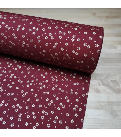 Japanese cotton fabric with golden sakuras over cherry red