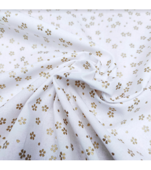 Japanese cotton fabric with golden sakuras over white