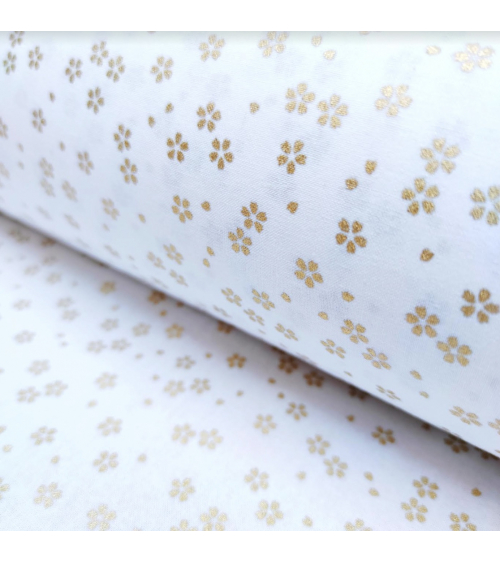 Tela japonesa de algodón en blanco con sakuras doradas