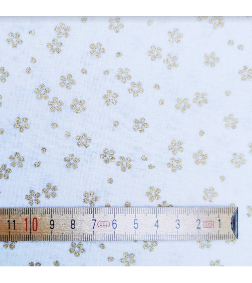 Japanese cotton fabric with golden sakuras over white