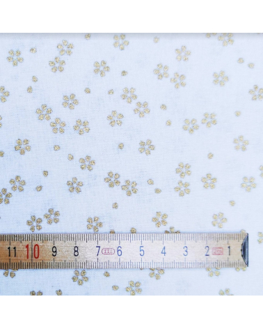 Japanese cotton fabric with golden sakuras over white