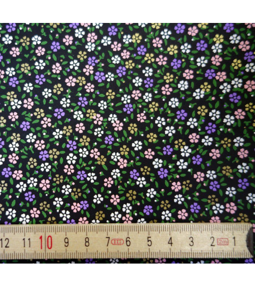 Papel japonés chiyogami alegres florecillas sobre fondo negro