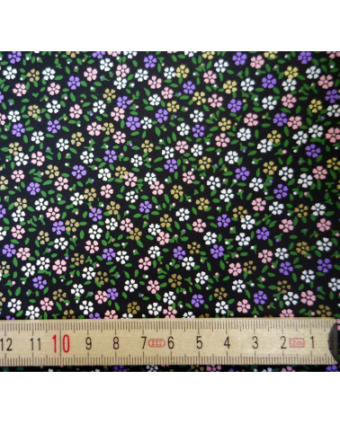 Papel japonés chiyogami alegres florecillas sobre fondo negro