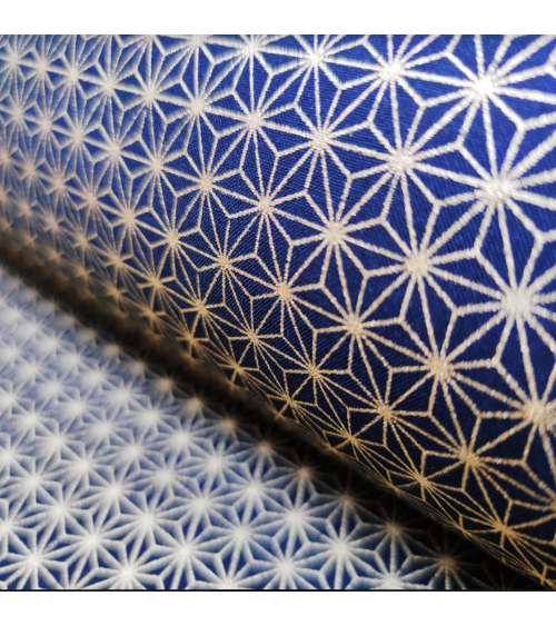 Japanese cotton fabric with golden asanohas over black