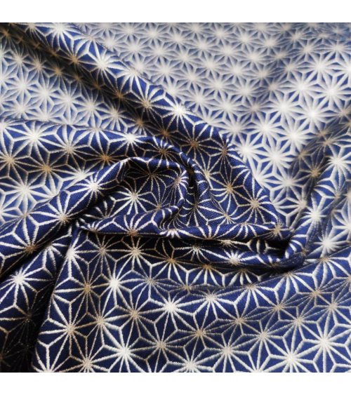 Japanese cotton fabric with golden asanohas over black