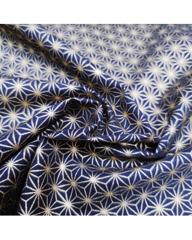 Japanese cotton fabric with golden asanohas over black