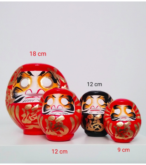 Amuleto daruma dorado 12 cm.