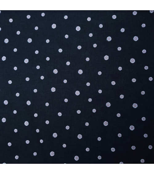 Japanese cotton-linen fabric with irregular polka dots over black background